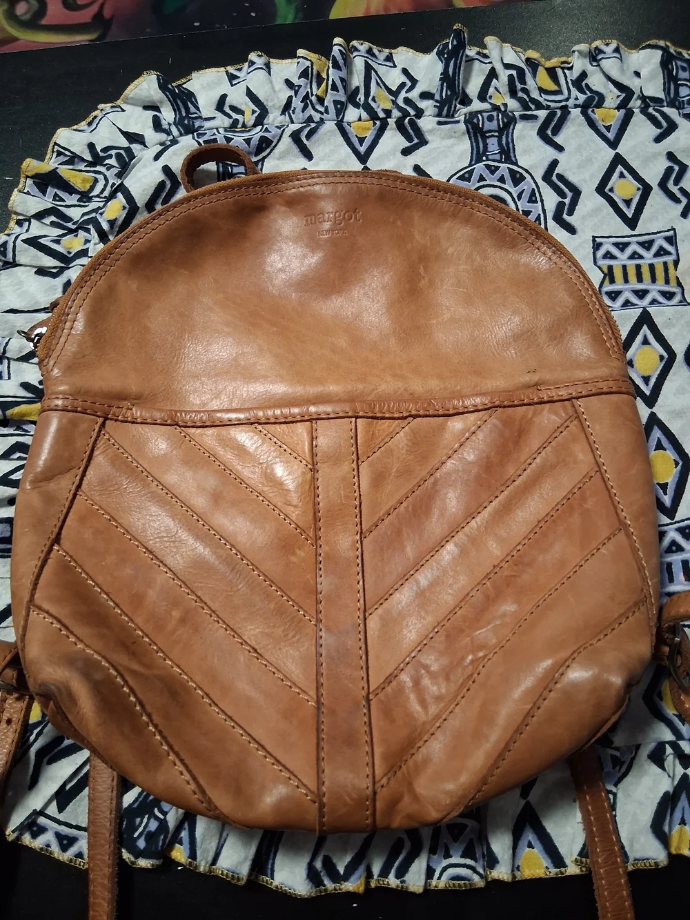 margot Tan Leather Round Mini Backpack with Chevron Stitch